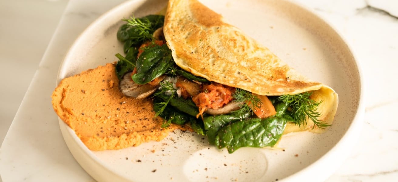 Omelette with a bread placed on plate